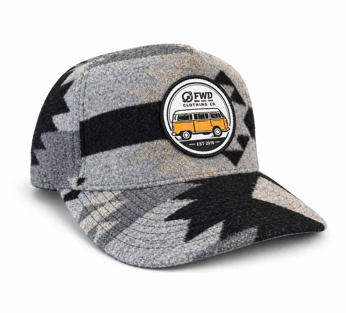 A gray and black patterned cap with a circular embroidered patch on the front. The patch features the text 'FWD CLOTHING CO' and an illustration of a yellow vintage van.